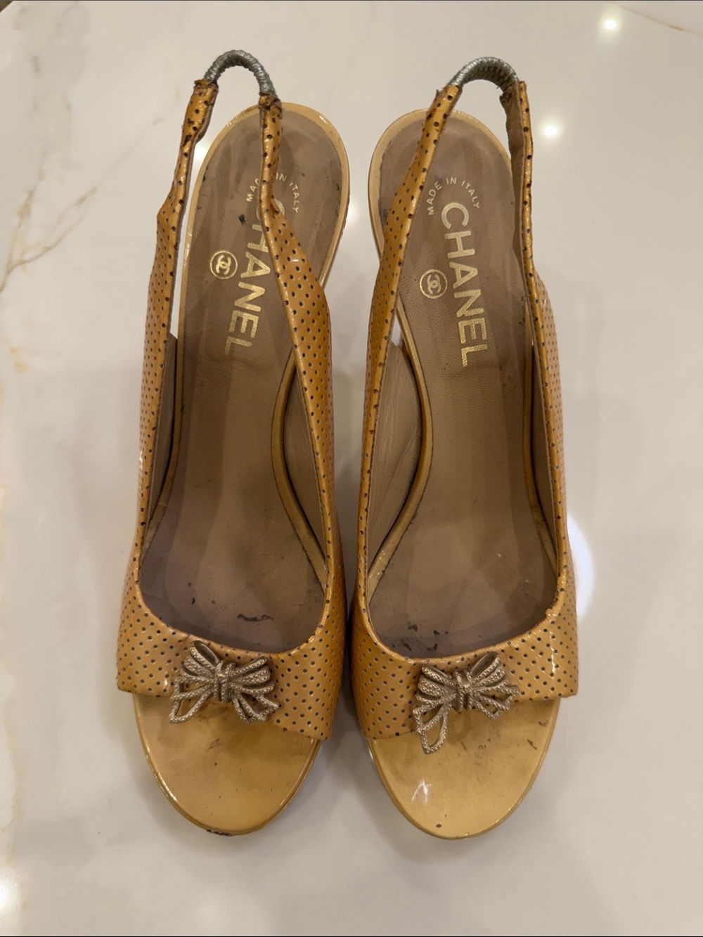 CHANEL Tan Perforated Slingback Peep-Toe Pumps with Bow Accent